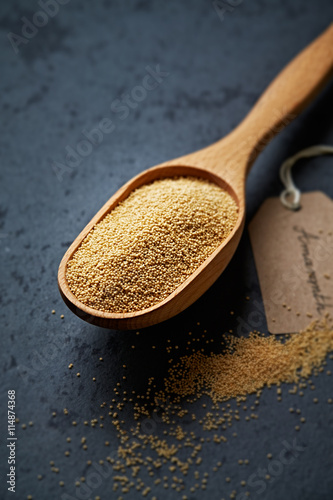 Obraz na płótnie Organic amaranth in a measuring spoon