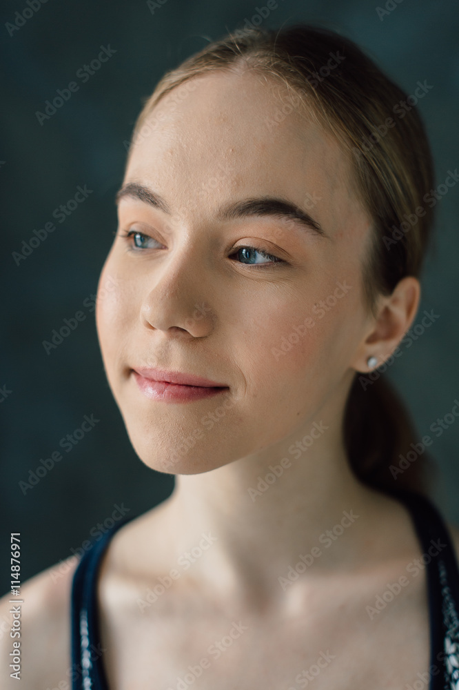 Sexual sports girl with a good body goes in for sports and youga on a dark background Sexual sports girl with a good body goes in for sports and youga on a dark background