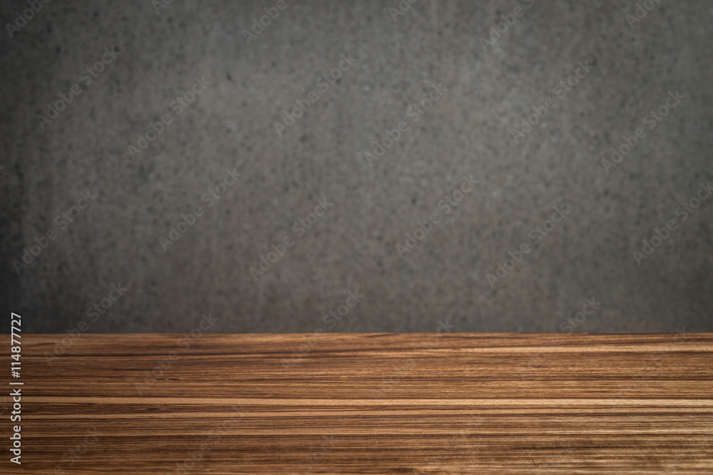Wooden board in front of concrete wall. Template mock up for dis Wooden board in front of concrete wall. Template mock up for dis