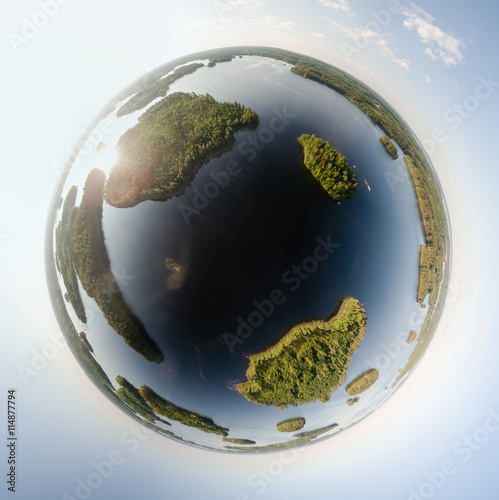 Fotografie Little planet of islands at a lake