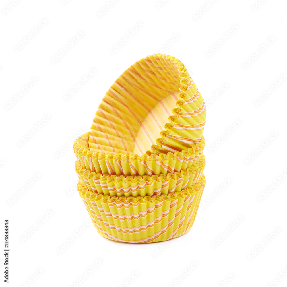 Yellow paper cupcake cup isolated