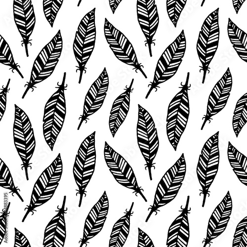 Hand drawn feather seamless pattern. Monochrome feather pattern for wrapping paper, textile, fabric, wallpaper.