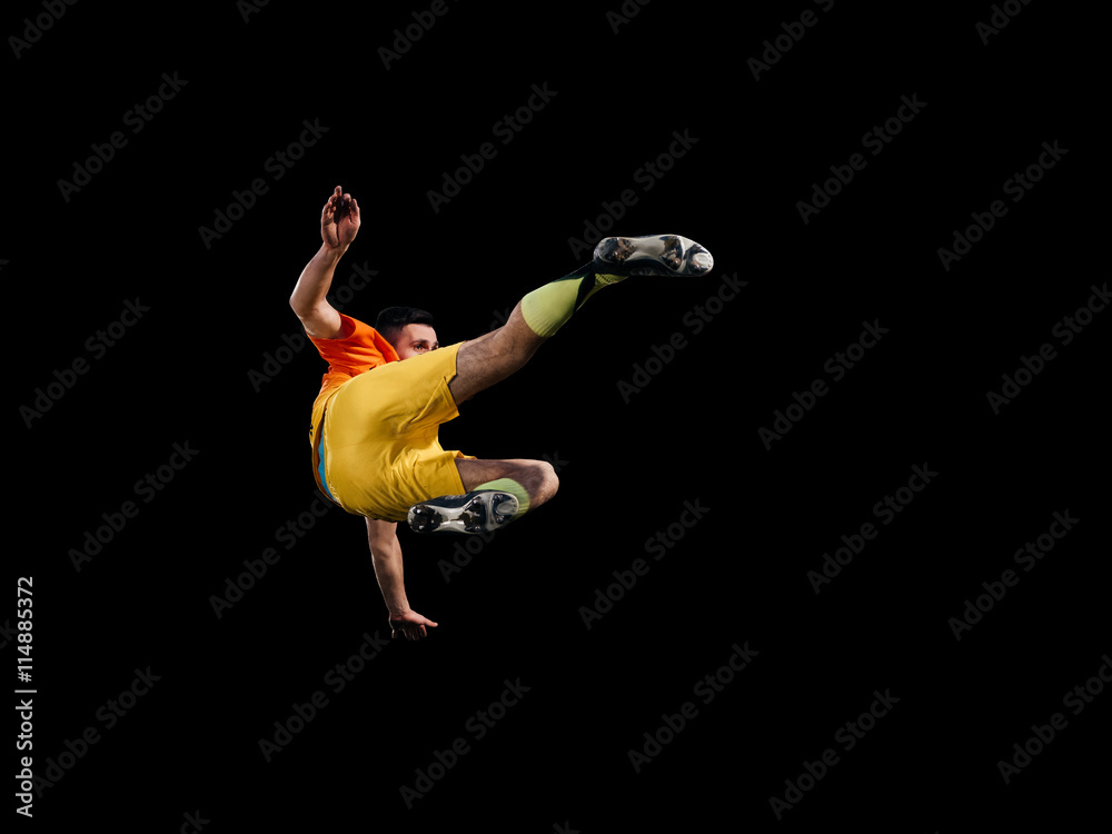 Caucasian soccer player kicking on training isolated