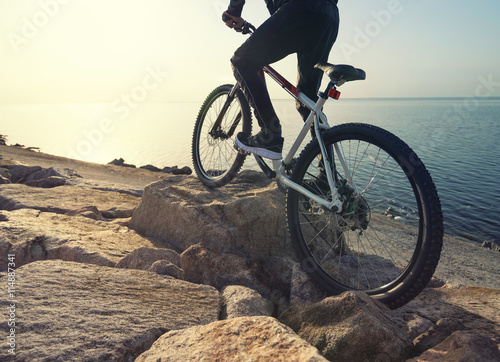 Ride on bike on the road. Sport and active life concept in the summer time