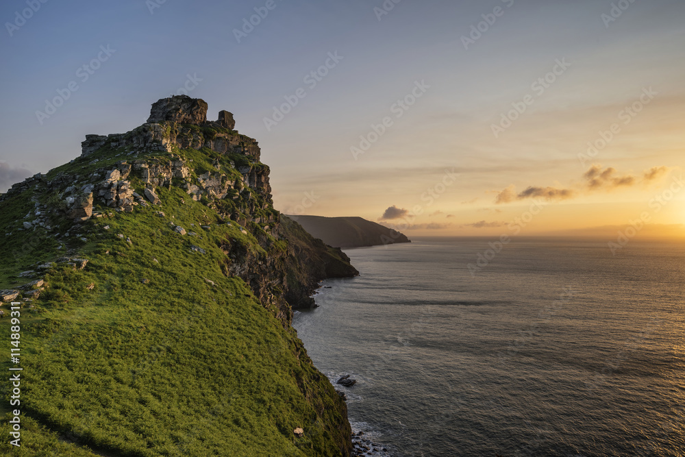 Beautiful evening sunset landscape image of Valley of The Rocks