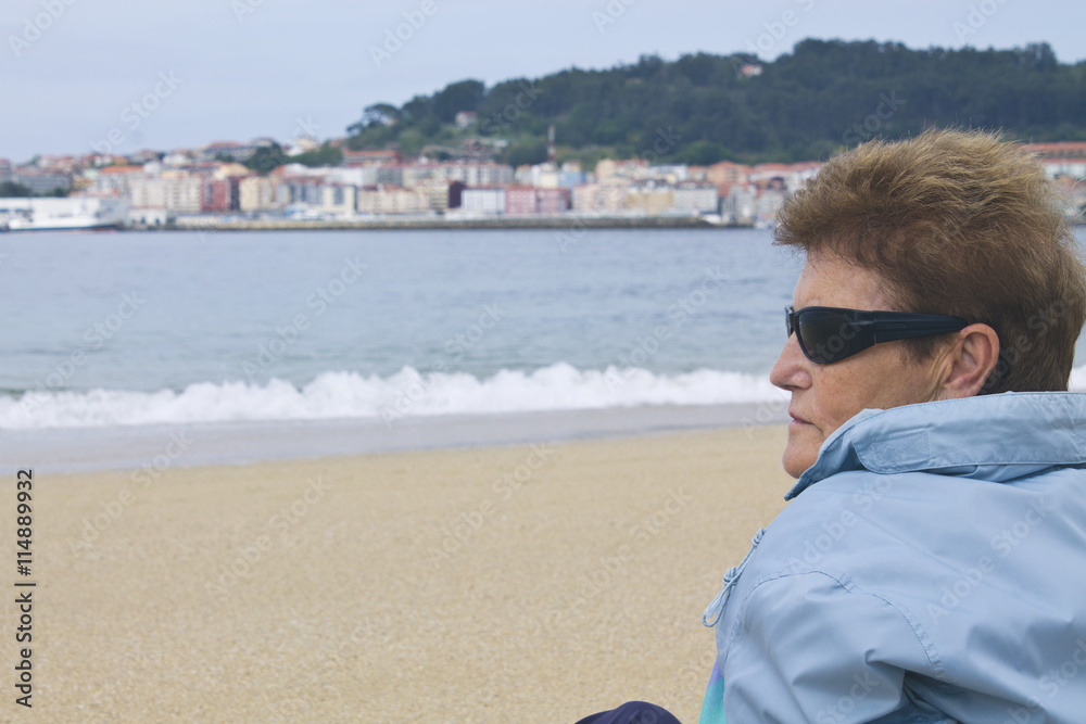 woman senior on the beach
