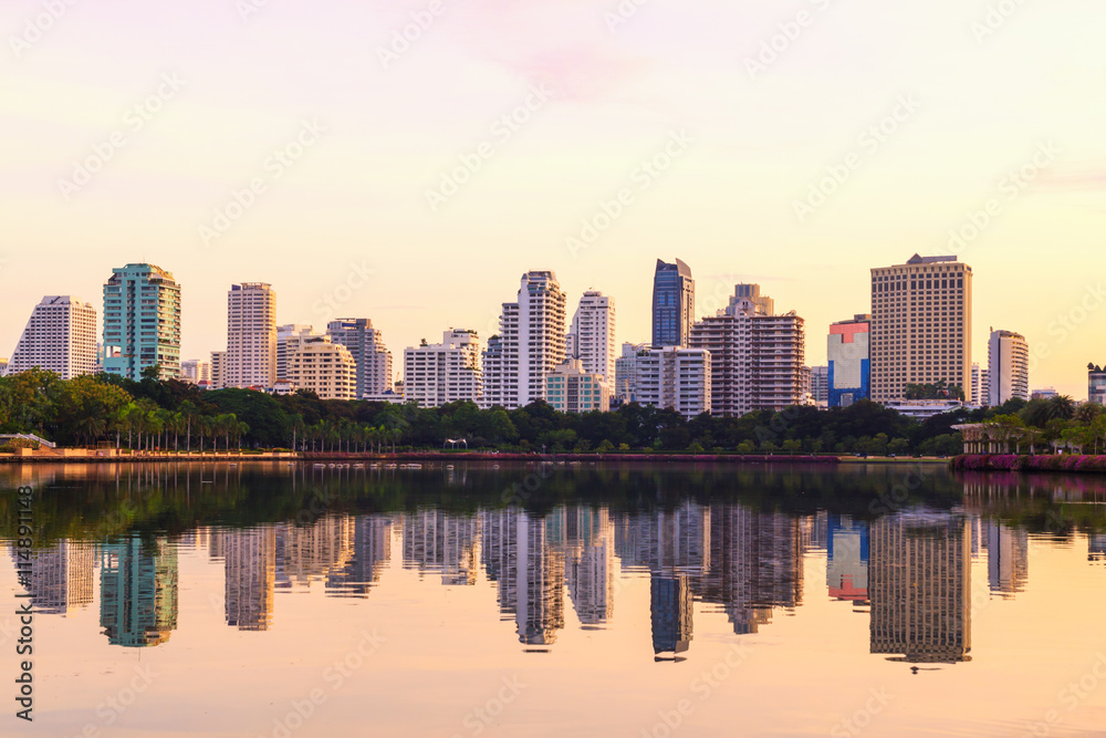 Bangkok city sunrise reflection river of sun. Panoramic view light blue background of glass high rise building skyscraper commercial of future. Business concept of success industry tech architecture