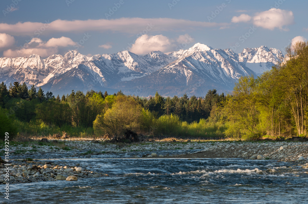 Beautiful panorama over Bialka river to snowy Tatra mountains, Poland Beautiful panorama over Bialka river to snowy Tatra mountains, Poland