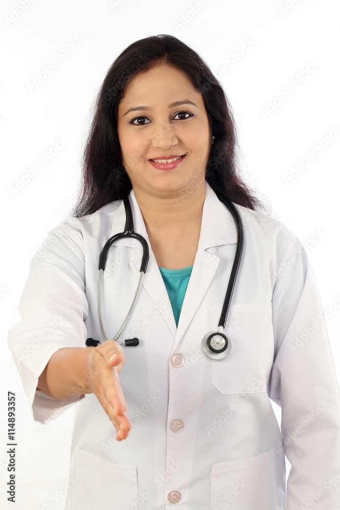Friendly female doctor ready to give shake hand Friendly female doctor ready to give shake hand
