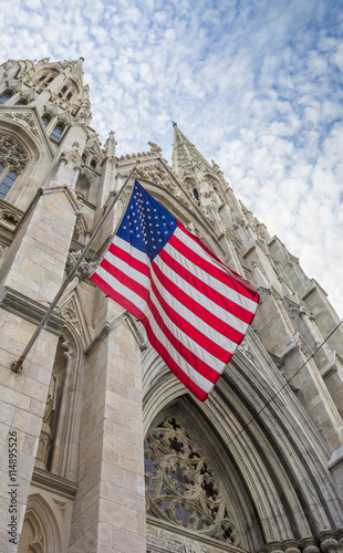 American flag at St. Patricks cathedral in New York City, USA