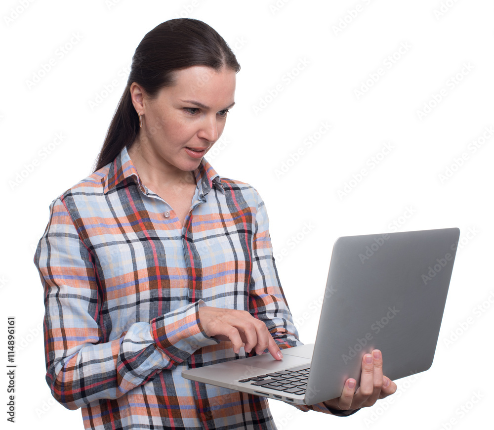 young brunette woman working on laptop. isolated young brunette woman working on laptop. isolated