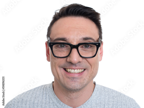 Young man with glasses smiling isolated © spaxiax