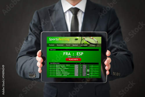 фотографія Sports betting website on tablet
