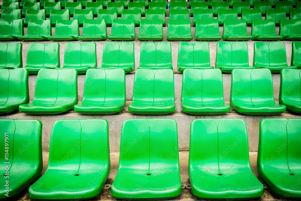 Naklejka premium plastic green seats on football stadium