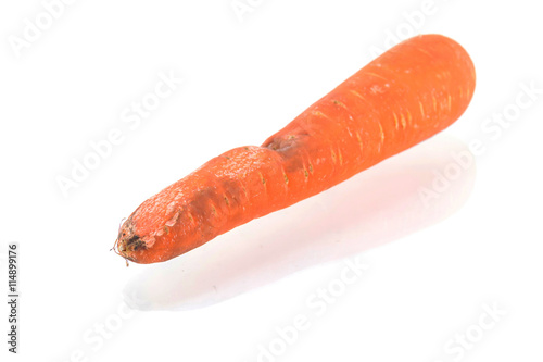 Rotten carrot isolated on white background