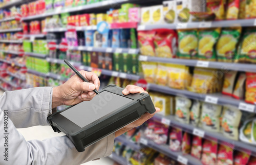 Bluetooth barcode scanner checking goods in Supermarkets