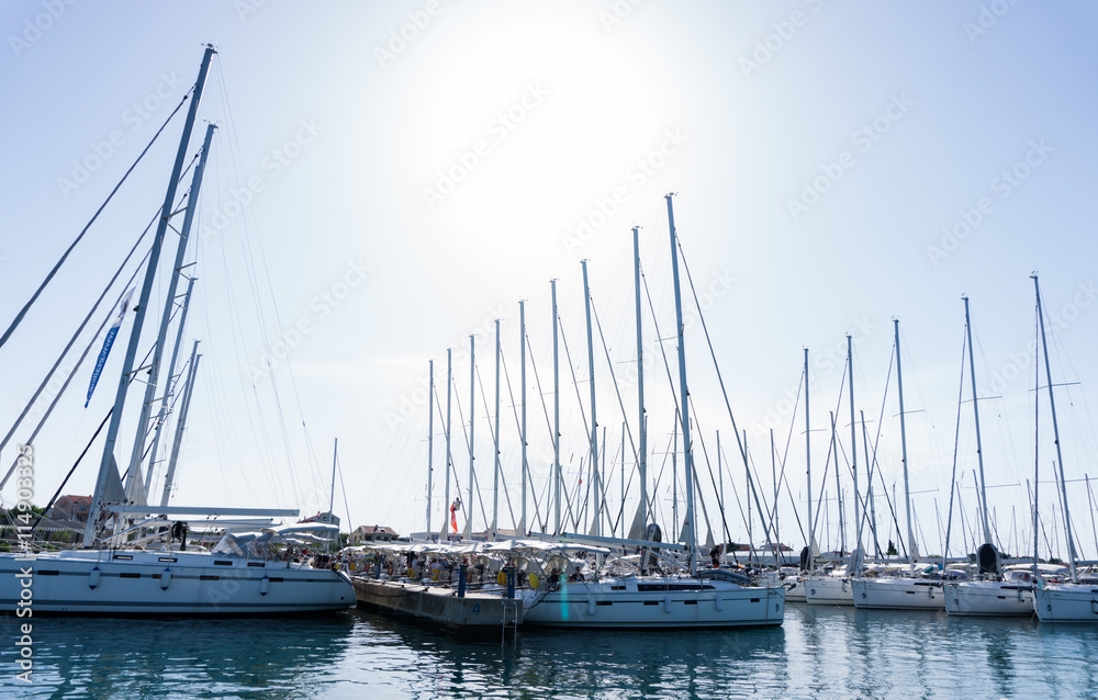mast against a blue sky, ship mast, marina in European city, the