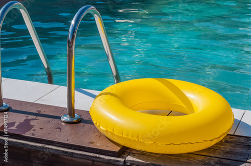 Inflatable circle lies on the edge of the pool