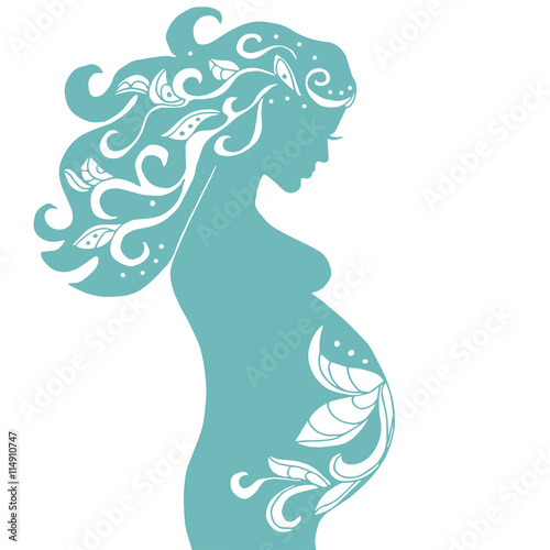 pregnant woman with vintage ornament in turquoise color