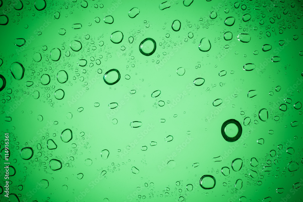 Raindrops on green glass, Water droplets on green glass for a ba