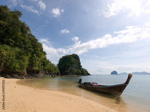 Traditional long-tail boat on a beach of Koh Yao Yai island, Tha