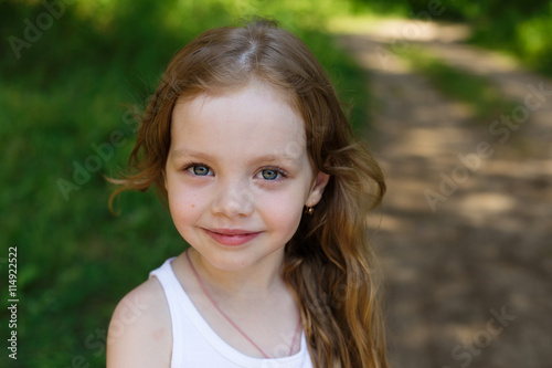 portrait of a beautiful young girl with long hair © Nadya Kolobova