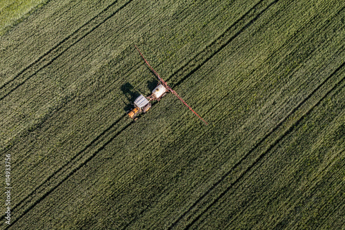 aerial view of the tractor on harvest field © mariusz szczygieł