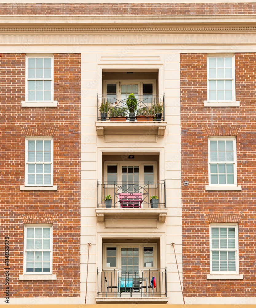 Red brick apartment symmetry.
