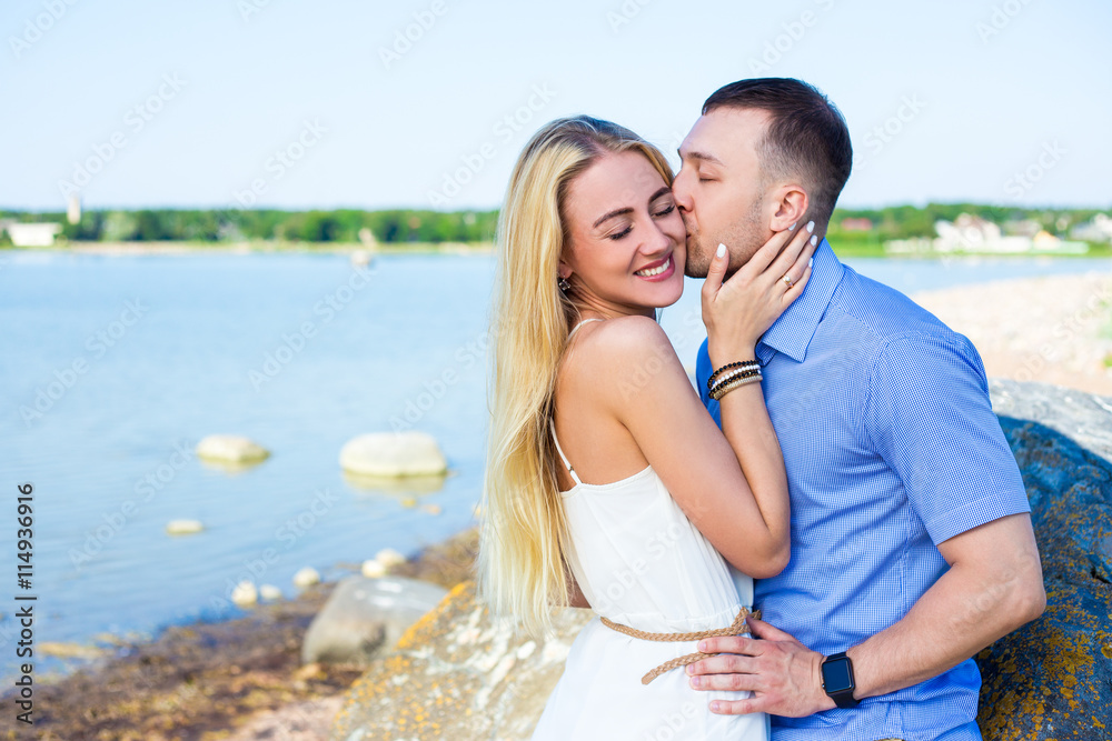portrait of happy beautiful couple in love hugging and kissing o portrait of happy beautiful couple in love hugging and kissing o