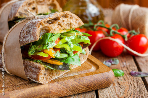 veggie sandwich with vegetables and pesto photo