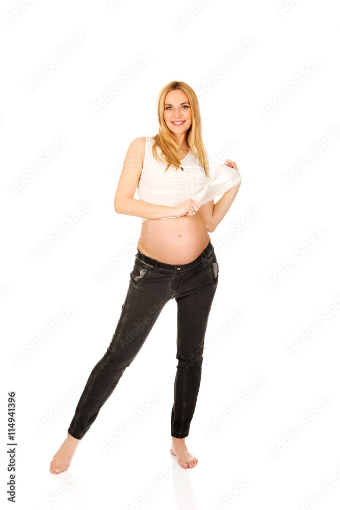 Fototapeta premium Happy pregnant woman looking at camera