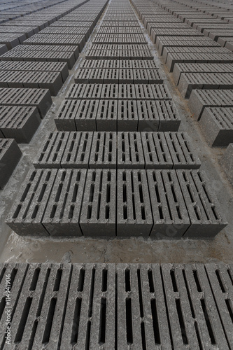 Stack of gray bricks © IEGOR LIASHENKO