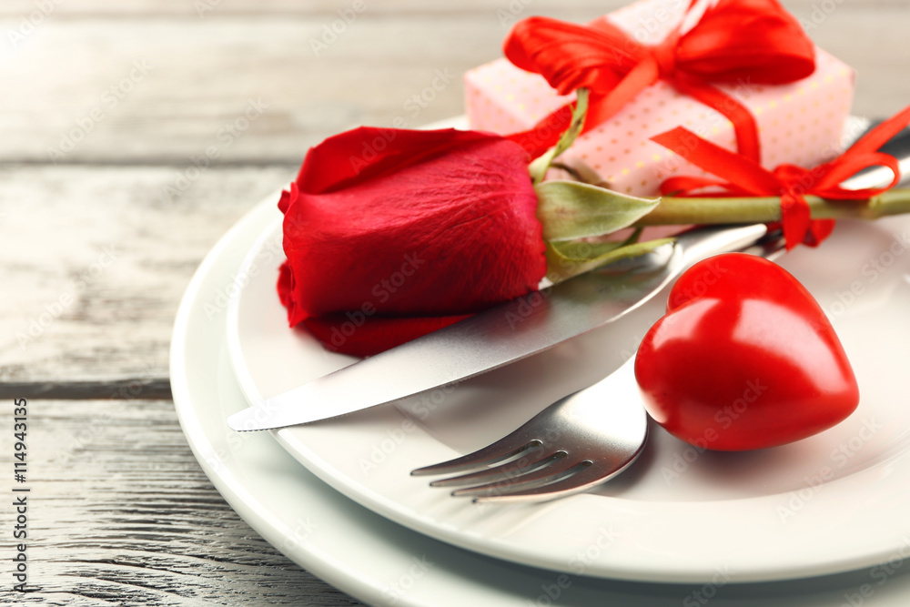 Festive table setting for Valentines Day on wooden background Festive table setting for Valentines Day on wooden background
