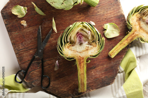 Artichokes on cutting board