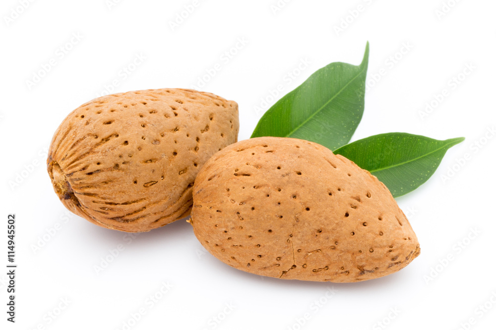 Almonds with leaves isolated on white background Almonds with leaves isolated on white background