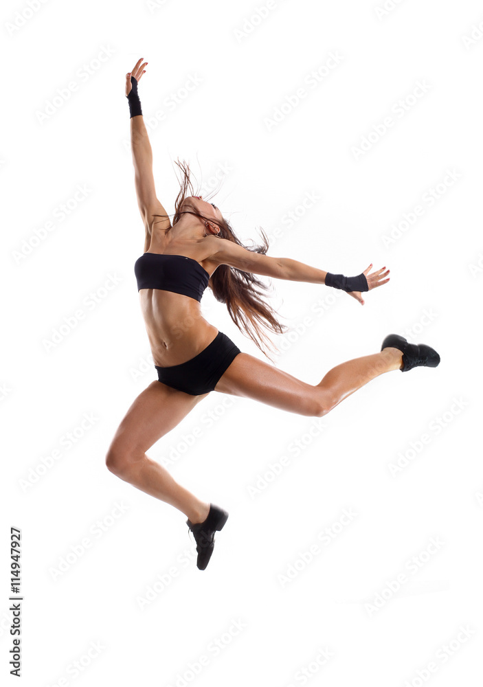 Stylish and young modern style dancer jumping