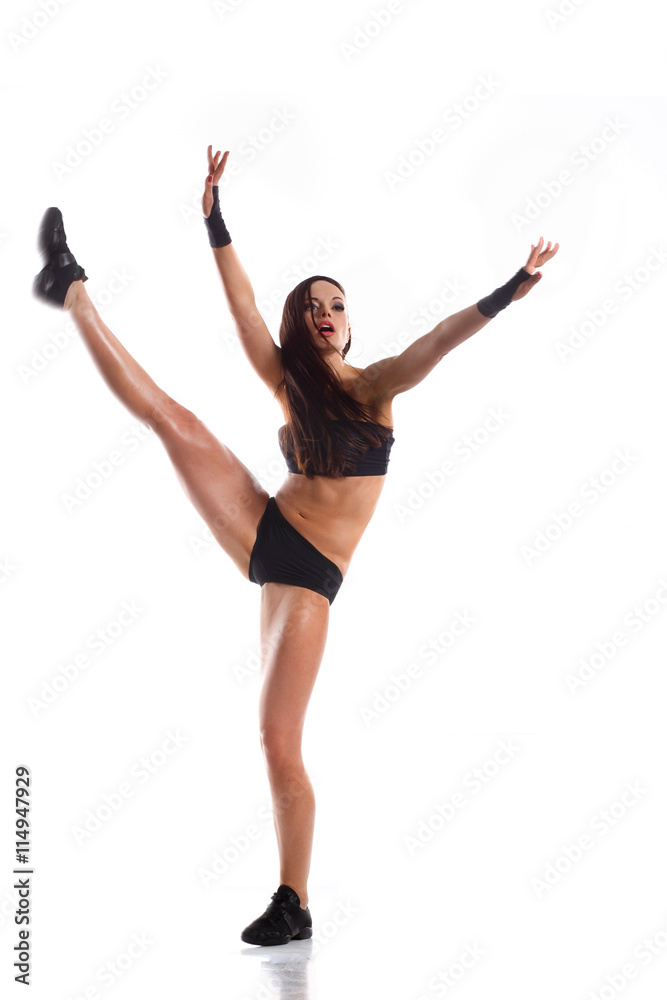 Stylish and young modern style dancer jumping