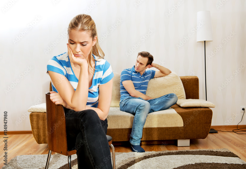 Sad couple not talking after fight