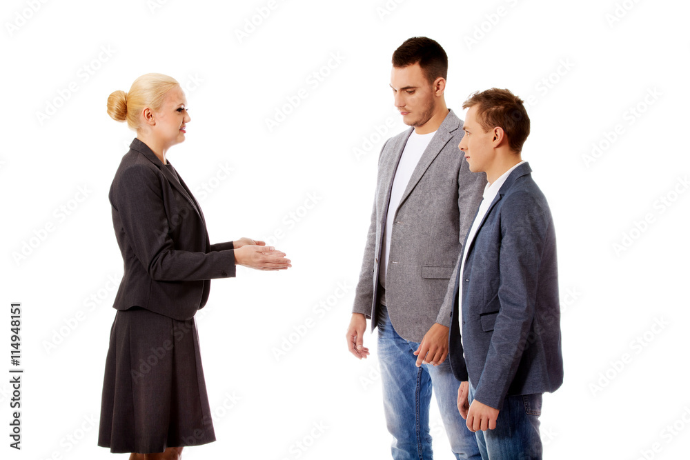 Boss businesswoman screaming at her employees Boss businesswoman screaming at her employees