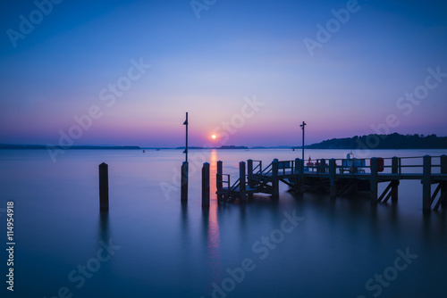 Fototapeta Naklejka Na Ścianę i Meble -  Sunset over Boats in Poole Harbour