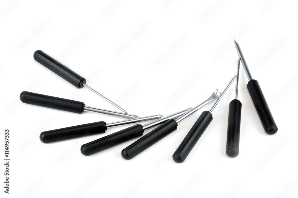 close up on screw driver with different heads close up on screw driver with different heads