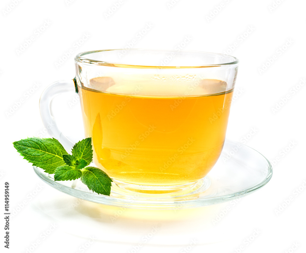 Transparent Cup of green chamomile tea with mint leaves On white background Transparent Cup of green chamomile tea with mint leaves On white background