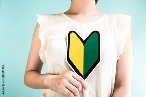 Quadro su tela 初心者マークを持つ女性