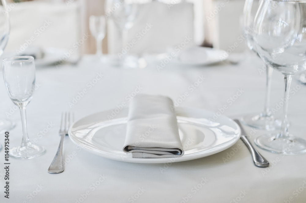 Empty Plate and Glass in Restaurant