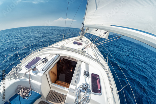 Sail boat moving in the sea