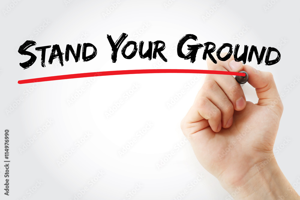 Hand writing Stand Your Ground with marker, concept background Hand writing Stand Your Ground with marker, concept background