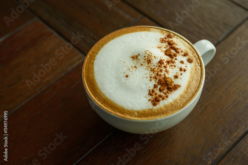 Latte coffee on wood table
