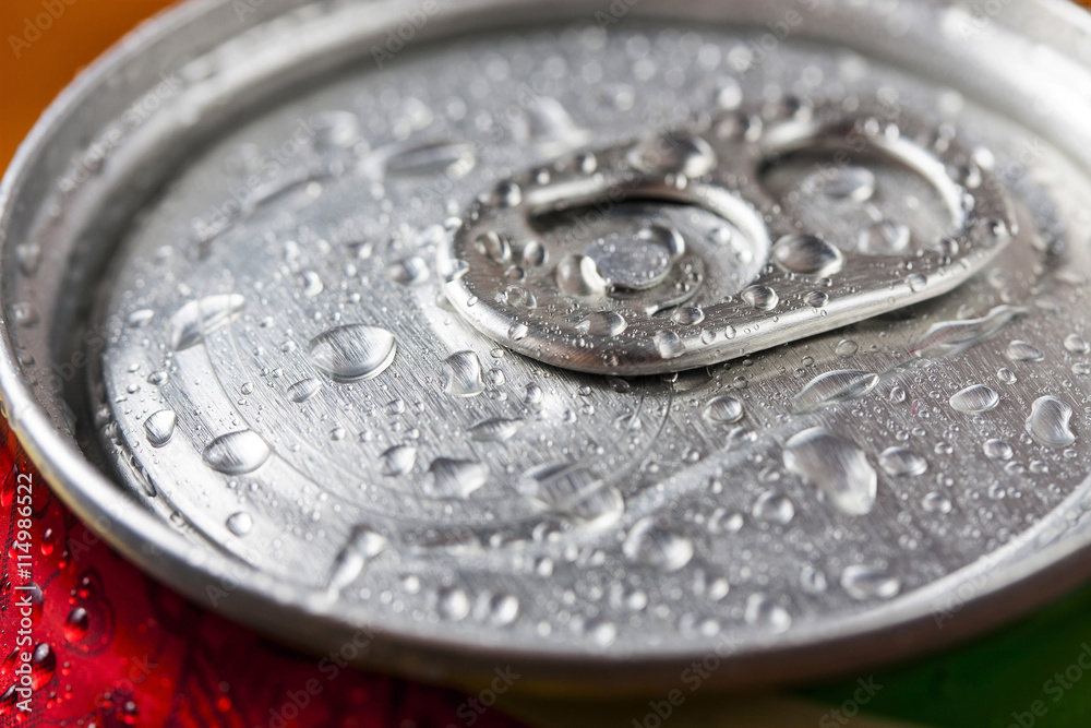 Top part of beer cans with water drops.Close up view Top part of beer cans with water drops.Close up view