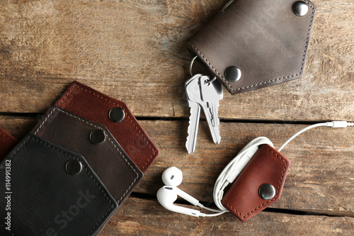 Few leather wallets with ke...
