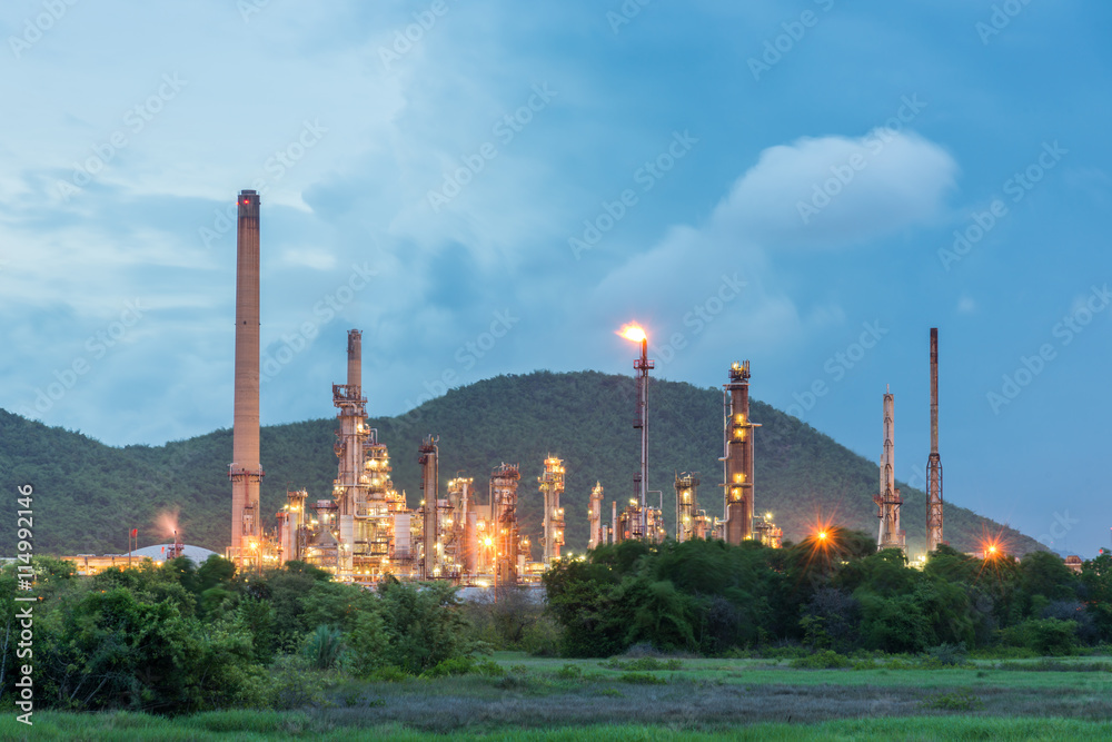 Oil refinery and Petroleum industry at night Oil refinery and Petroleum industry at night